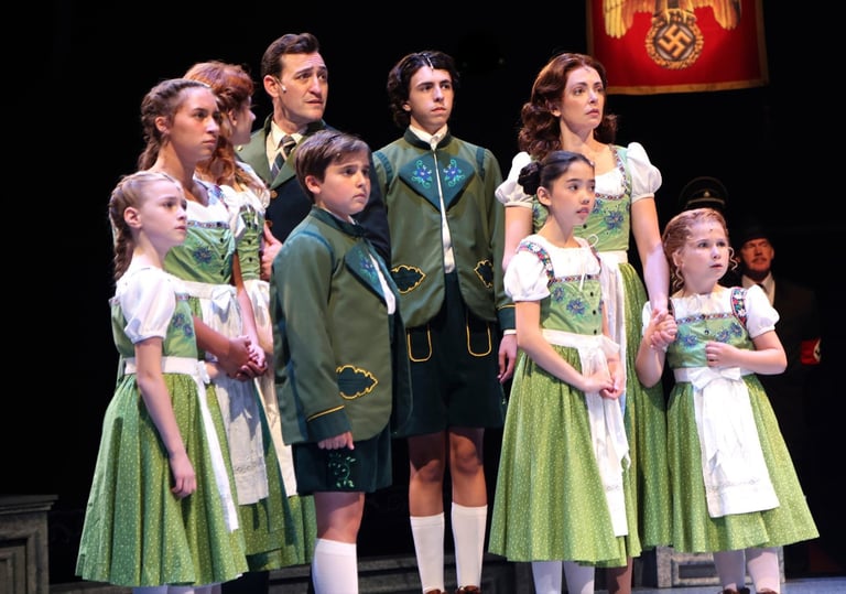 a group of people standing on a stage