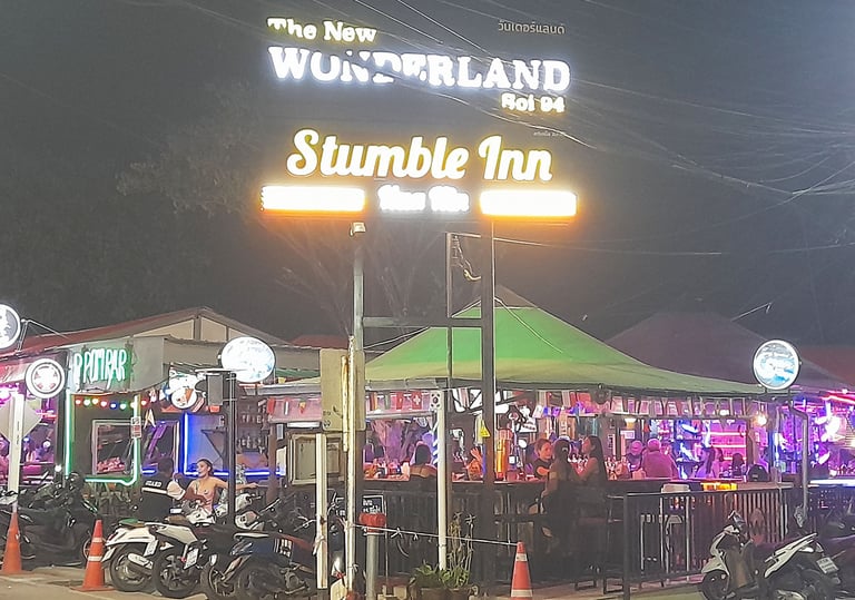Street view of Wonderland bar complex and sign in Hua Hin