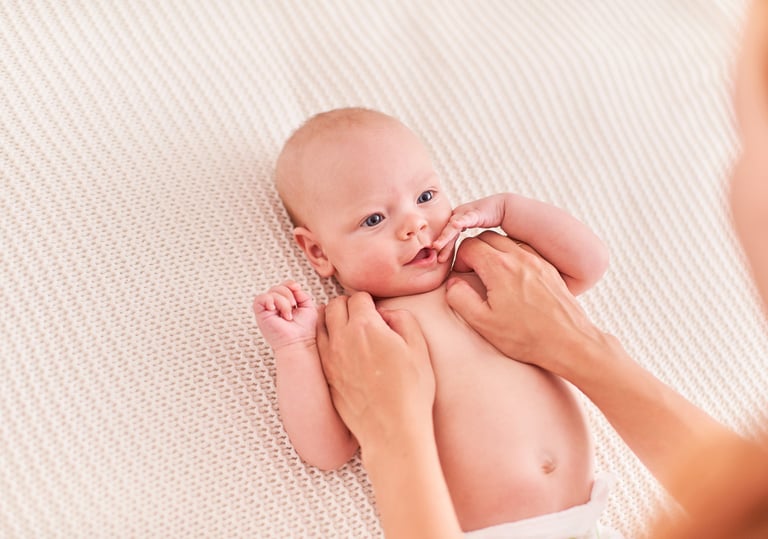 a baby is being held by a woman