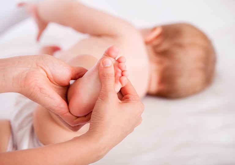 a baby's feet and feet are shown in this picture