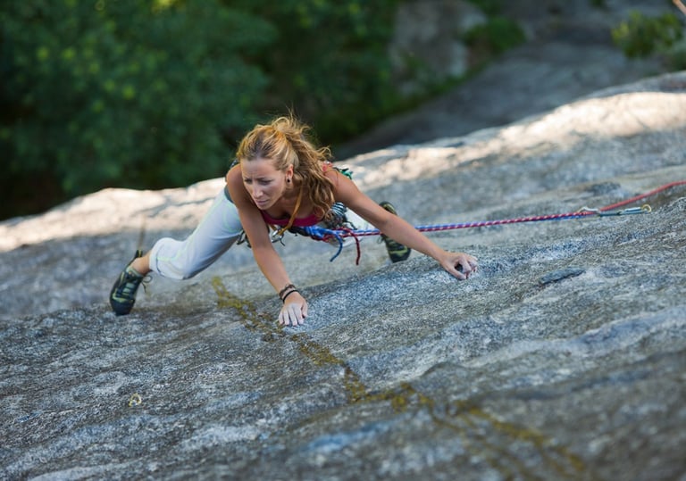 Laura dealing with friction climbing in val di mello