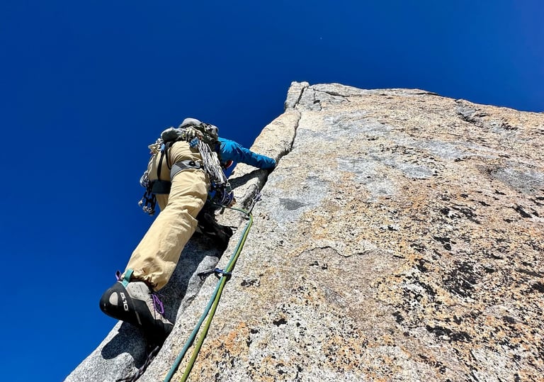 Hand jamming on Spigolo Vinci, Pizzo Cengalo. Valmasino, Italy