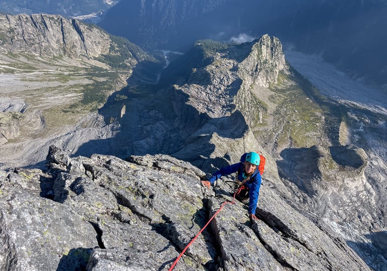 Climbing in the sun — High on the north ridge of Piz Badile.