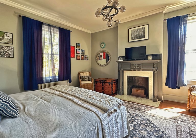 bedroom with fireplace 2123 rivermont apartments