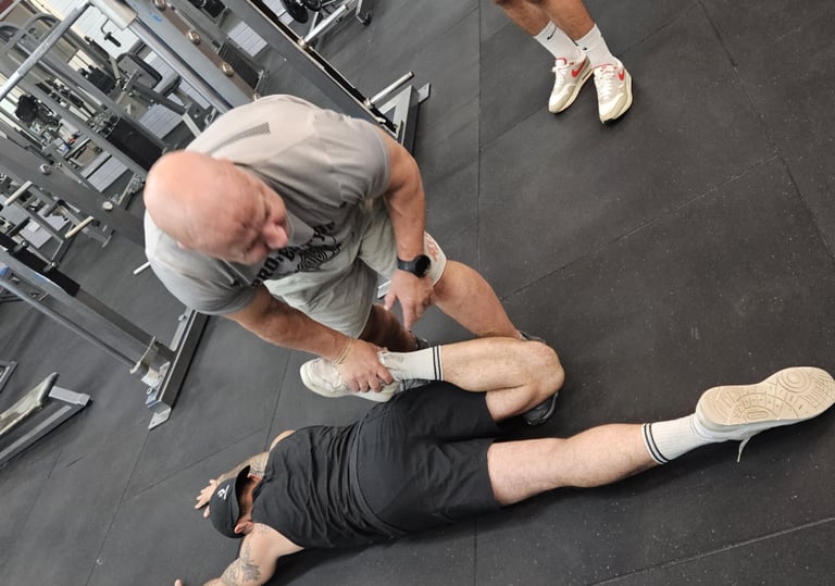 Partner-assisted stretching for mobility in guided end-range work to improve hips an