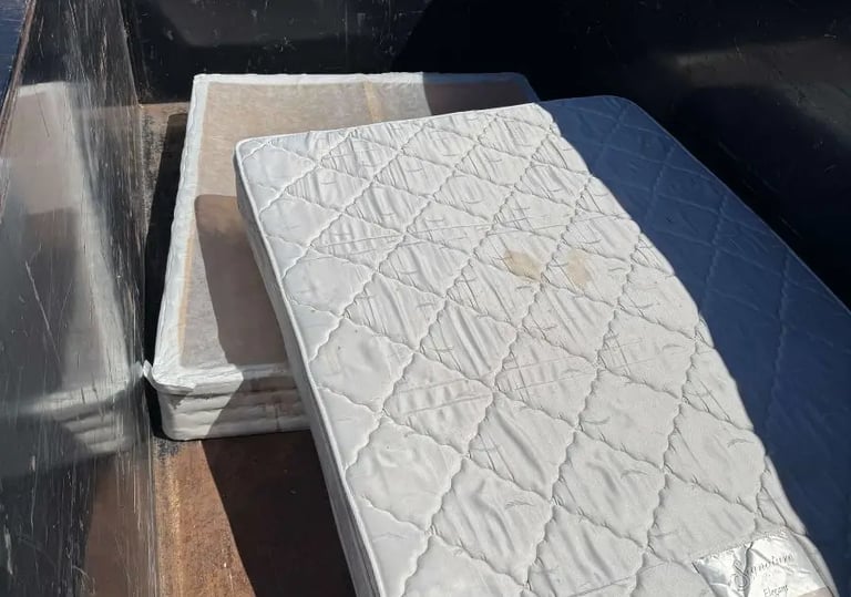 Mattres and box spring in a trailer