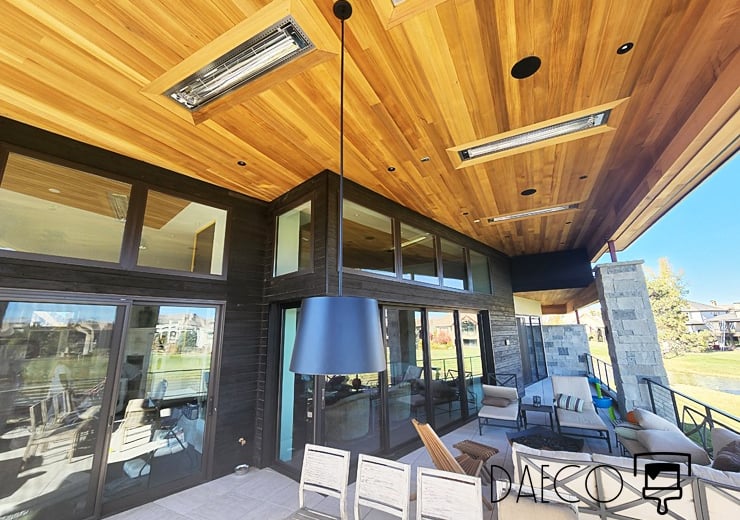 a patio with a patio table and chairs Boulder House Painters