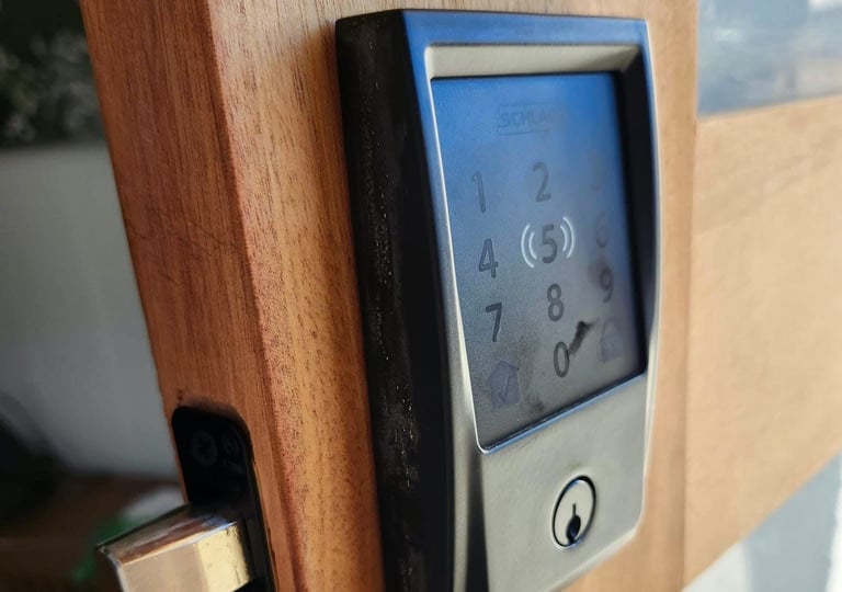 Close up of keypad lock on a house door representing local locksmith of Spruce Pine, NC