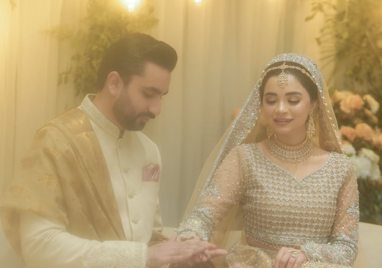 a man and woman in a wedding dress