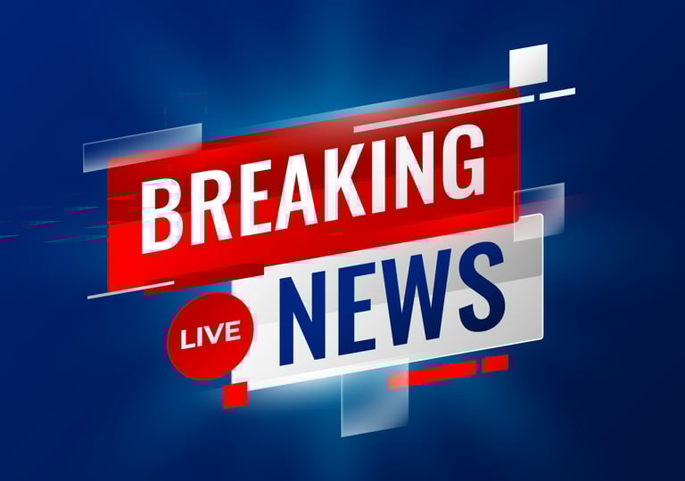 a newsreek with a red and white breaking news