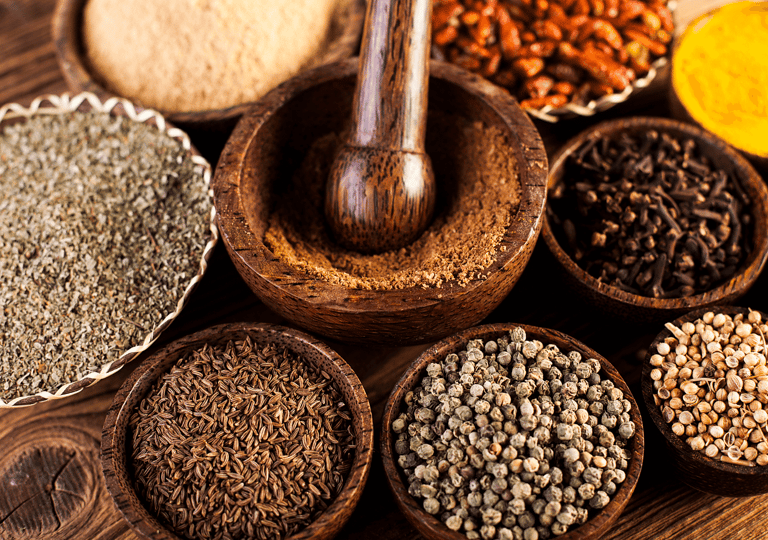 a variety of spices and spices in bowls