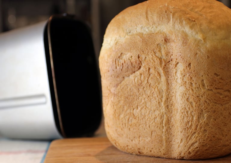 a loafed loafed bread on a cutting board