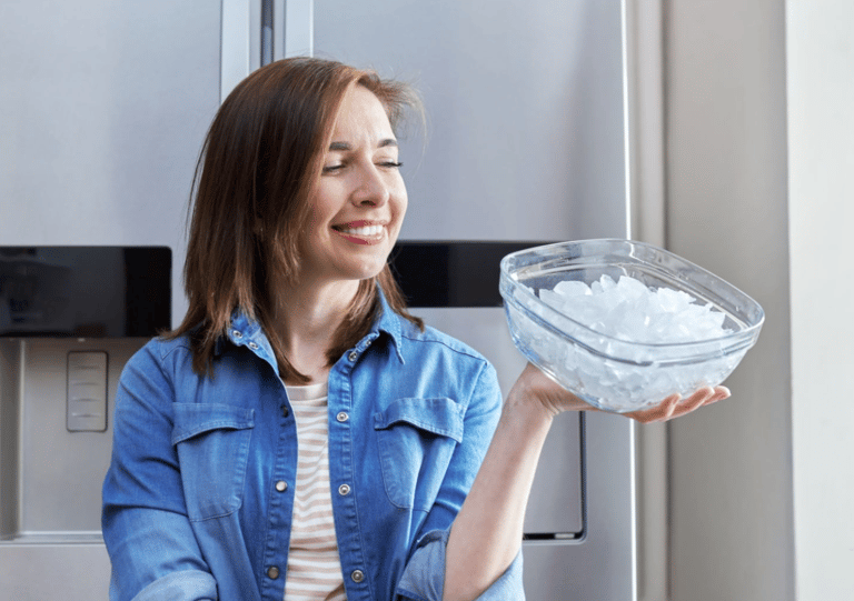a woman holding a bowl of ice cream