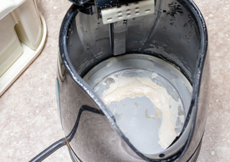 a person is using a blender to make a mess