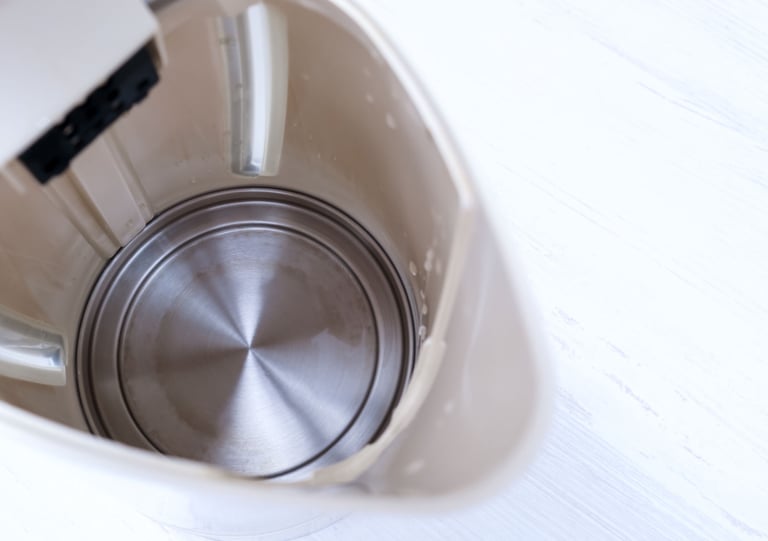 a blender with a metal bowl and a metal bowl
