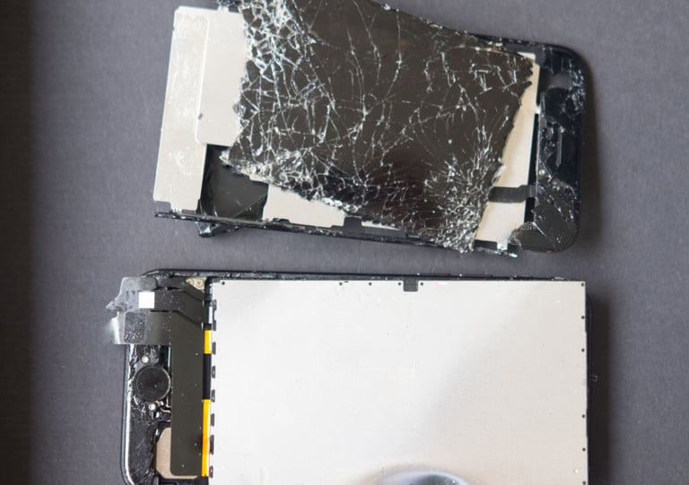 a broken phone with a broken screen and a broken phone