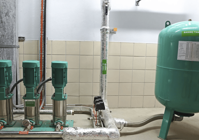 a large green tank with a green tank and a blue tank