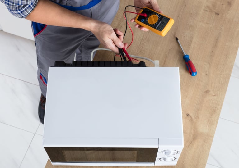 a man in a blue apron and a white shirt is holding a multimetered