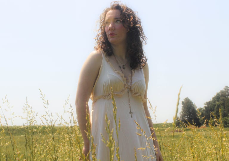 Ethereal high school senior portrait at golden hour at crockett park, virginia