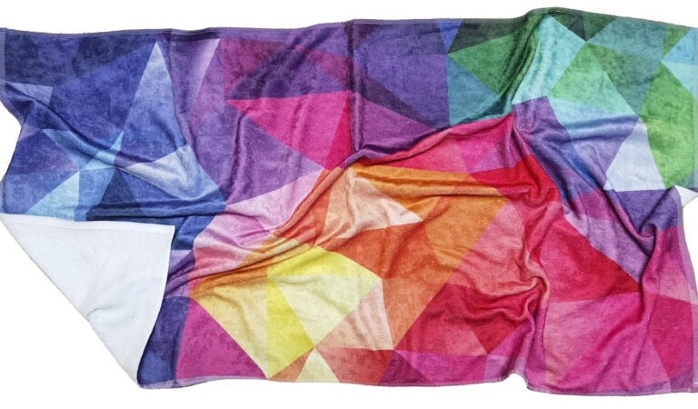 a colorful blanket blanket with a colorful geometric design