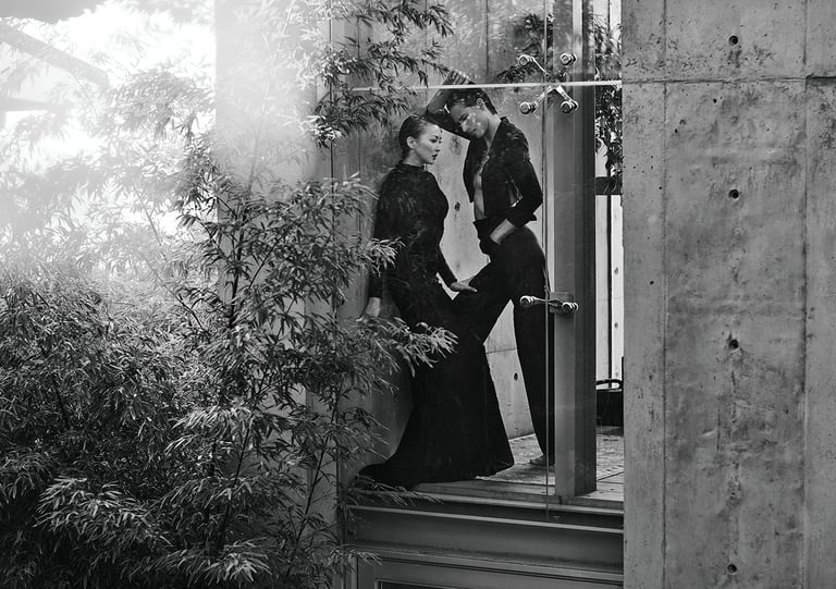 Elizabeth Lotz (Liz Lotz) art director fashion editorial in architectural landscape with two models in black and white elegan