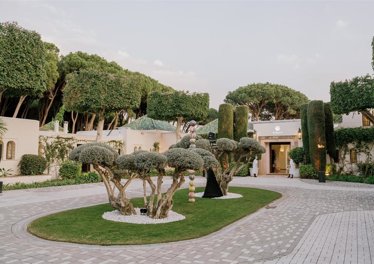 Elegant corporate event entrance at Villa El Rincon Marbella with landscaped gardens