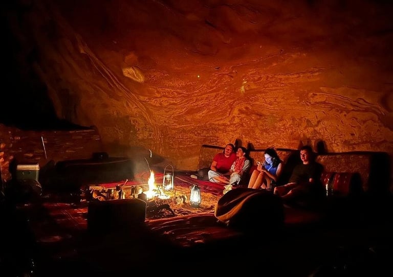 a group of people sitting around a campfire