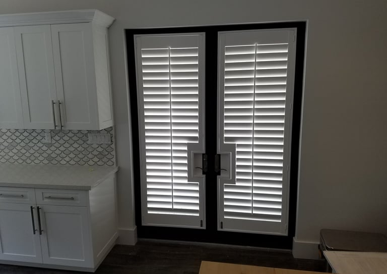 French Door Shutters, with rectangular cut out. Other options would be a semicircle
