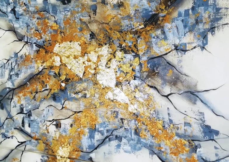 a painting of a tree branch with gold, grey and white paint