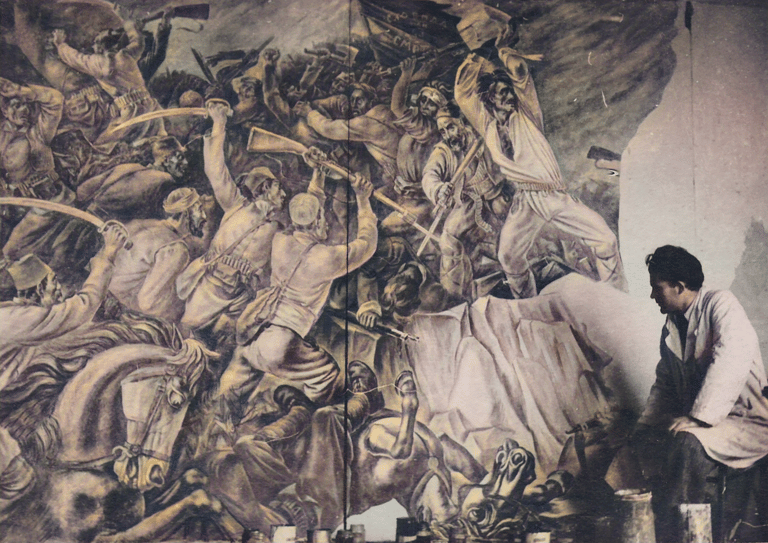 Borko Lazeski infront of the mural Ilinden