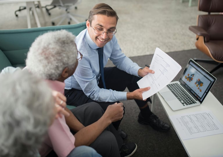 Agent presenting to client couple
