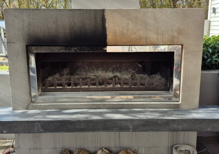 Before and after professional cleaning of a modern concrete outdoor fireplace with firewood.
