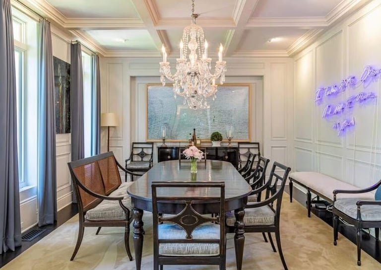 Sofia Richie dining room with chandelier and elegant modern decor.