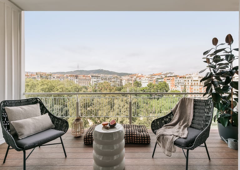 Private terrace with stunning views and outdoor seating, designed for RAMA in Barcelona Turo Park