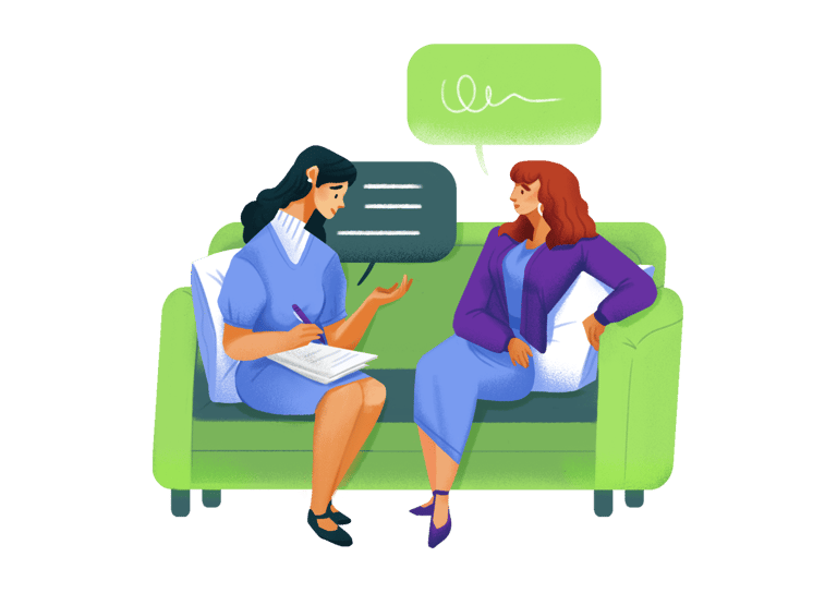 a woman sitting on a couch with a laptop