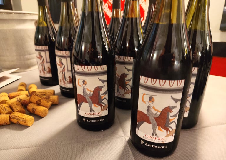 Bottiglie di Canaiolo Toscana Rosso IGT San Gregorio durante la degustazione
