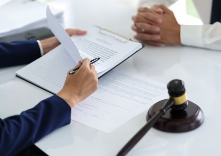 defense lawyer reviewing files