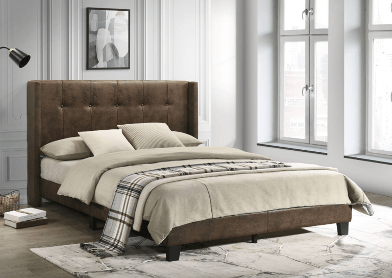 Modern brown faux leather upholstered bed frame with a button-tufted headboard in a bright bedroom.