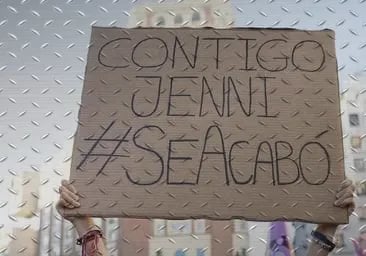 a protest sign that reads,'contagged by a sign that says,