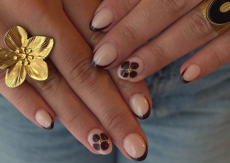 a woman's hands with rings and rings on her fingers
