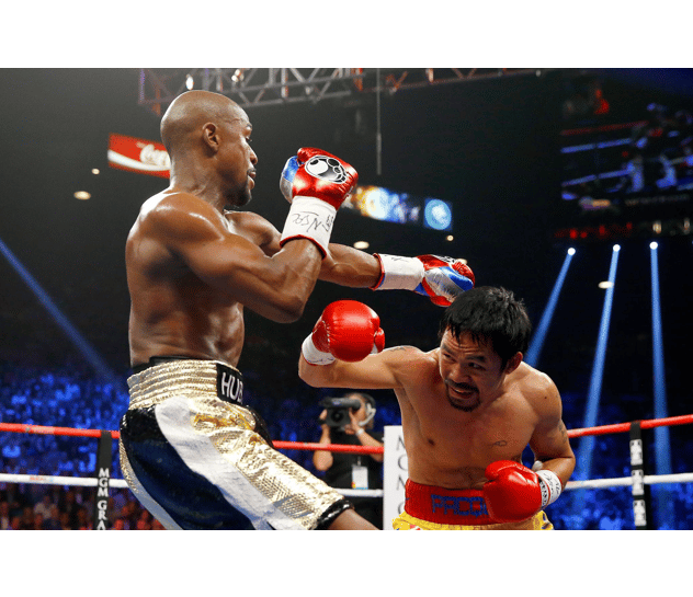 Professional boxers Floyd Mayweather and Manny Pacquiao competing in a championship boxing match ring.
