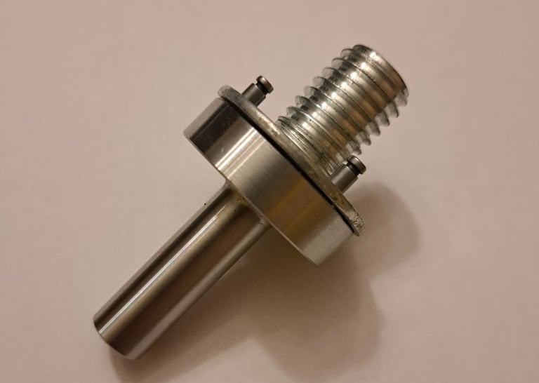 Precision-machined metal dowel pin with threaded stud for structural or framing applications in construction