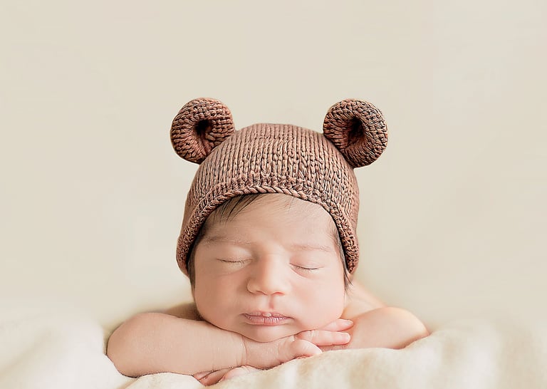 newborn photography baby wearing crochet teddy bear beanie bonnet