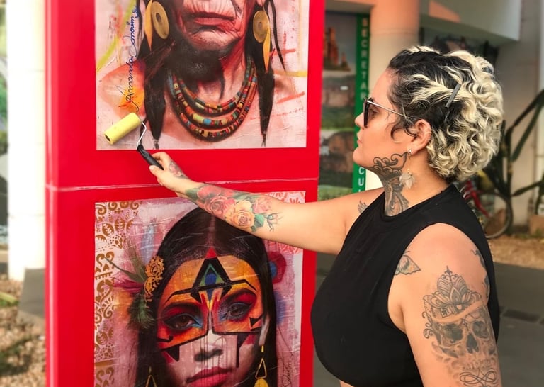 Amanda Amorim, que em Barra do Garças–MT têm realizado oficinas e murais com técnicas de lambe-lambe