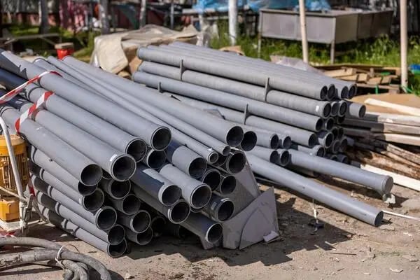 Construction materials including pipes and industrial supplies for infrastructure projects