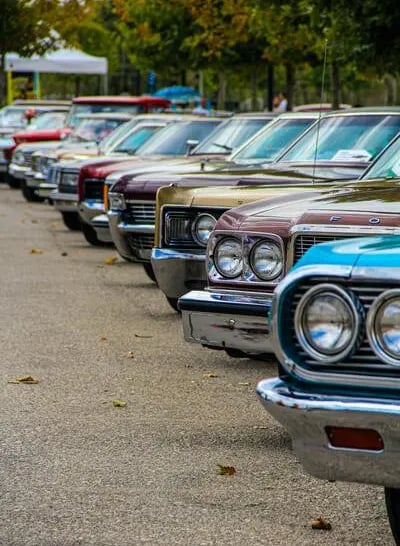 Automotive vehicles lineup representing automobile industry and component manufacturing sector