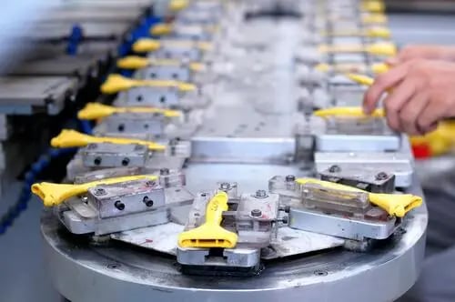 Manufacturing assembly line producing custom components and OEM products