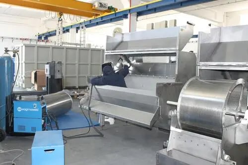 Sheet metal fabrication and metal component manufacturing in industrial facility