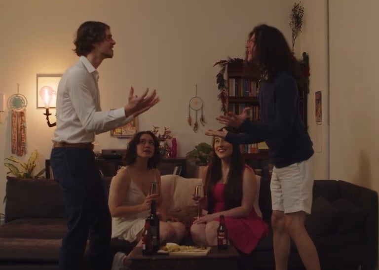 a man and woman standing in a living room
