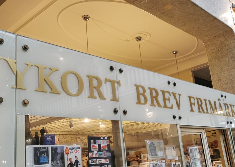 a storefront of a storefront with a sign that brev och vykort